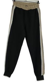 Dámské černo-béžové harémové kalhoty s pruhy