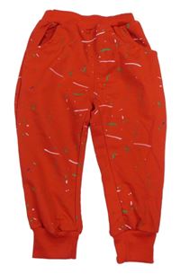 Červené tepláky s potiskem 