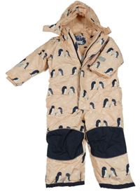 Meruňkovo-tmavomodrá šusťáková zimní kombinéza s tučňáčky a odepínací kapucí TCM