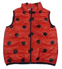 Červená puntíkatá šusťáková zateplená vesta 