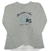 Bílé triko s nápisem a číslem