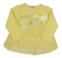 Žlutá mikina s mašlí a volánky 