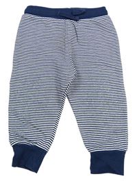 Tmavomodro-bílé pruhované tepláky M&S