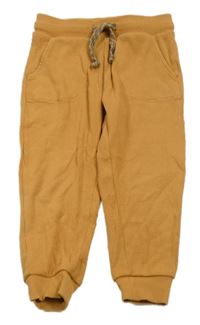 Okrové žebrované tepláky 