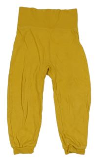 Okrové cuff tepláky s žirafou Lupilu 