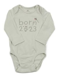 Smetanové body s nápisem a hrochem H&M