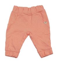 Neonově růžové puntíkaté tepláky