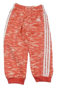 Korálové melírované tepláky s pruhy a logem Adidas