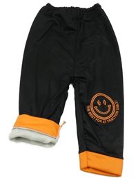 Černo-oranžové zateplené tepláky se smajlíkem 