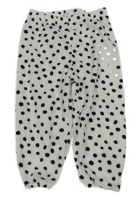 Bílo-černé puntíkaté plyšové pyžamové kalhoty Primark
