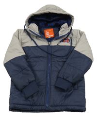 Tmavomodro-šedá šusťáková zateplená funkční bunda s výšivkou a kapucí Quechua