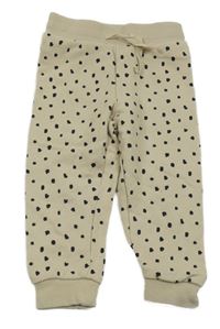 Béžové vzorované tepláky H&M