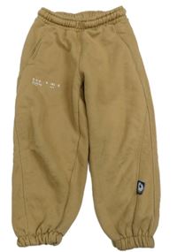 Béžové tepláky s nápisem Zara