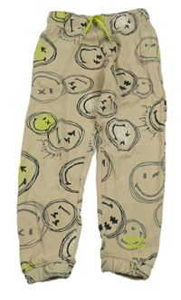 Béžové tepláky se smajlíky Smiley World 