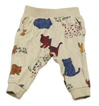 Béžové tepláky s šelmami H&M