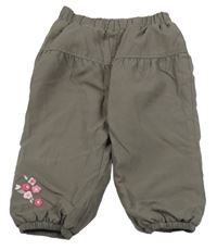 Hnědé šusťákové zateplené kalhoty s kytičkami 