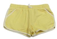 Žluté teplákové kraťasy s bílým lemem zn. Primark