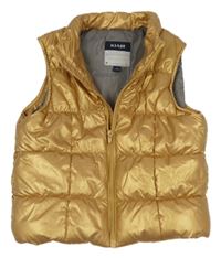 Zlatá šusťáková zateplená vesta Kiabi