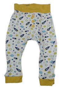 Bílo-žluté tepláky s vesmírem 