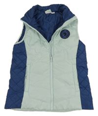 Mátovo-tmavomodrá šusťáková zateplená funkční vesta s nášivkou Crane