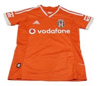 Červené sportovní tričko s nápisem a logem Adidas