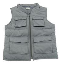 Šedá šusťáková zateplená vesta s kapsami F&F