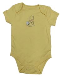 Žluté body s medvídkem Pú Primark 