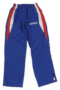 Modro-červeno-bílé šusťákové podšité kalhoty s nápisem