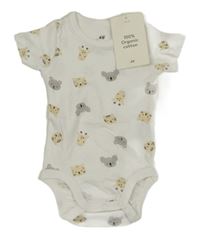 Nové - bílé body se zvířátky H&M