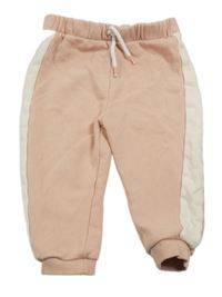 Světlerůžovo-bílé tepláky Tu