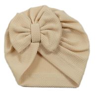 Světlepudrová vzorovaná turbanová čepice s mašlí