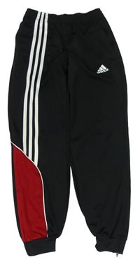 Černé sportovní tepláky s bílými pruhy a logem zn. Adidas