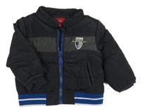 Tmavomodrá šusťáková zateplená bunda s nápisem S. Oliver