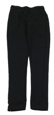 Černé tepláky Decathlon