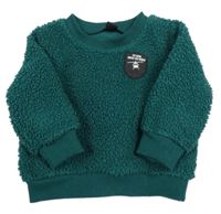 Tmavozelená huňatá mikina s nášivkou 