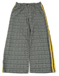 Černo-bílé kostkované teplákové kalhoty s proužkem C&A