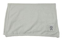 Šedá vzorovaná chlupatá deka se slonem