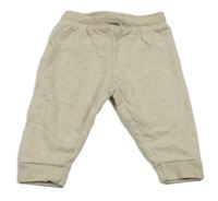 Béžové melírované tepláky 