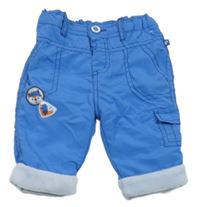 Modré šusťákové zateplené kalhoty s nášivkami Ergee