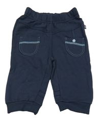 Tmavomodré tepláky s kapsami Berti