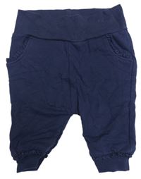 Tmavomodré tepláky s krajkovými volánky Topomini