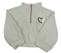 Bílý žinylkový svetr se srdíčkem z flitrů