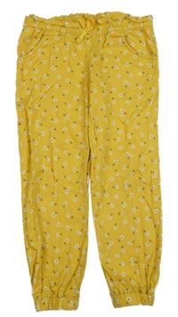 Žluté plátěné květované kalhoty H&M