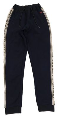 Tmavomodré tepláky s pudrovým pruhem s logy Scotch&Soda