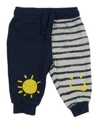 Tmavomodro-pruhované tepláky se sluncem a smajlíkem F&F
