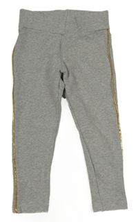 Šedé legíny se zlatými pruhy 