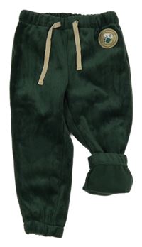 Tmavozelené plyšové žebrované tepláky s nášivkou 