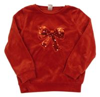 Červená plyšová mikina s mašlí z překlápěcích flitrů