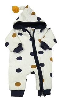 Bílá puntíkatá tepláková podšitá kombinéza s kapucí s bambulí