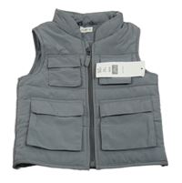 Nové- Šedá šusťáková zateplená vesta F&F